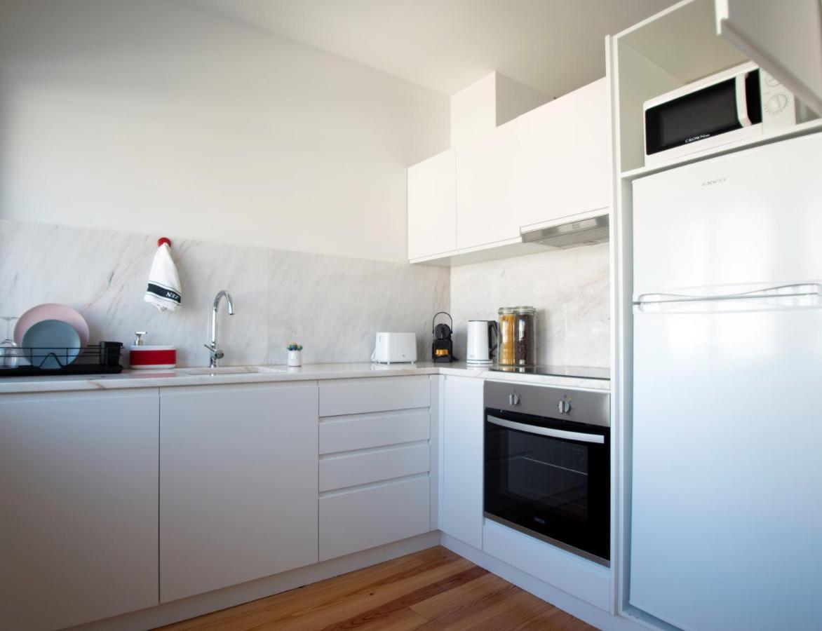 Guest H4U - Porto Batalha City Center Bagian luar foto