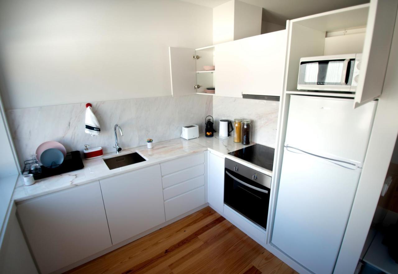 Guest H4U - Porto Batalha City Center Bagian luar foto