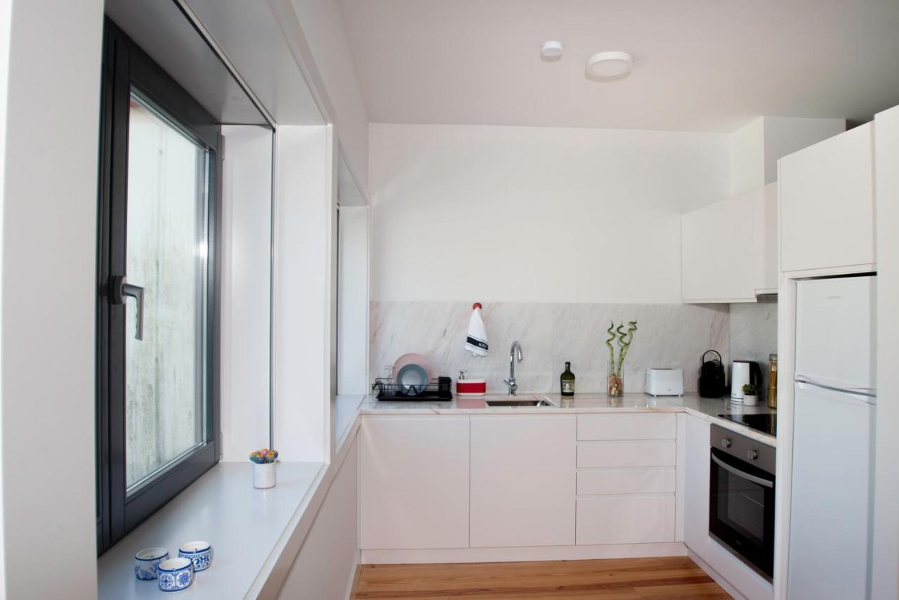 Guest H4U - Porto Batalha City Center Bagian luar foto