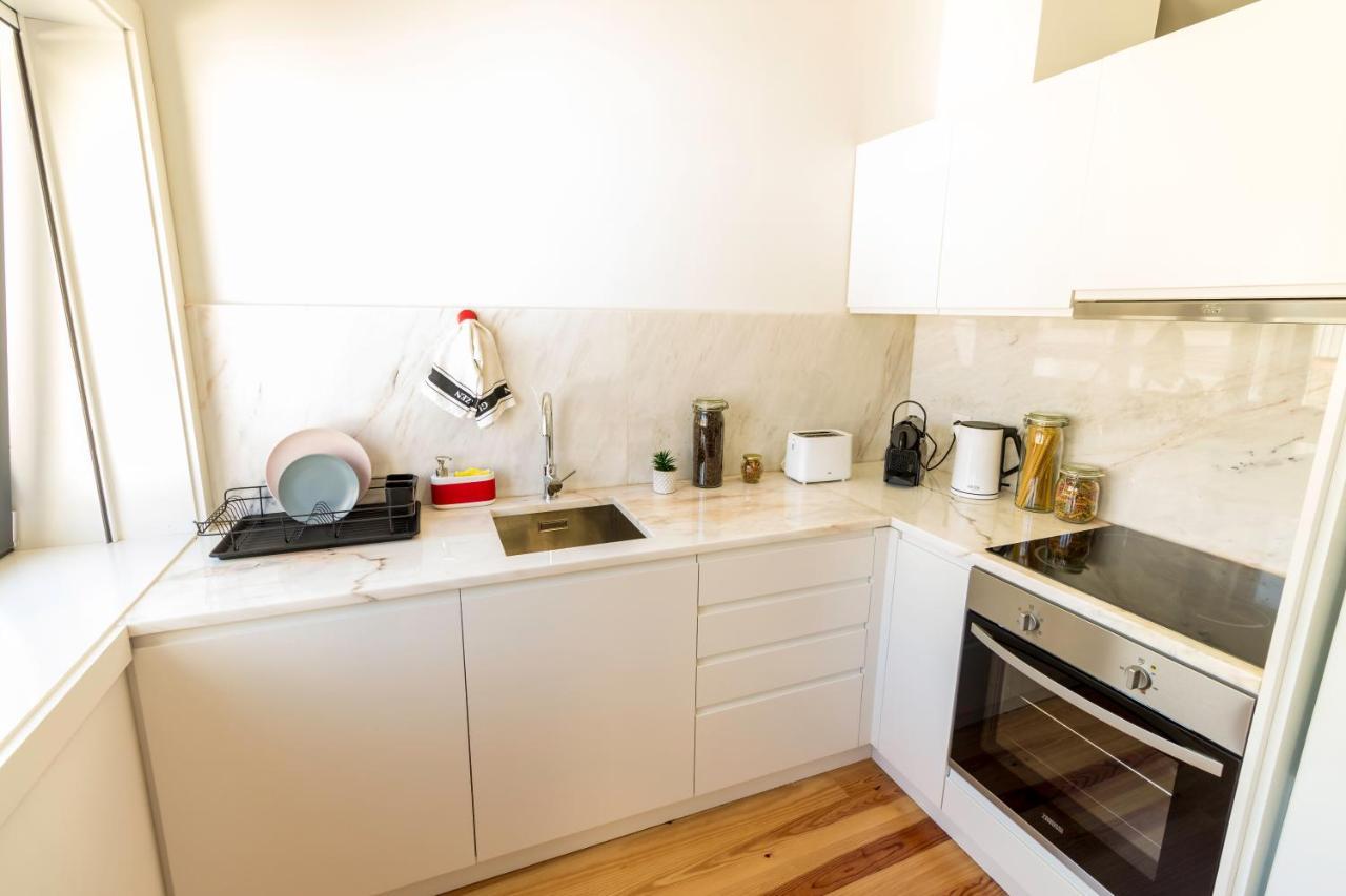 Guest H4U - Porto Batalha City Center Bagian luar foto