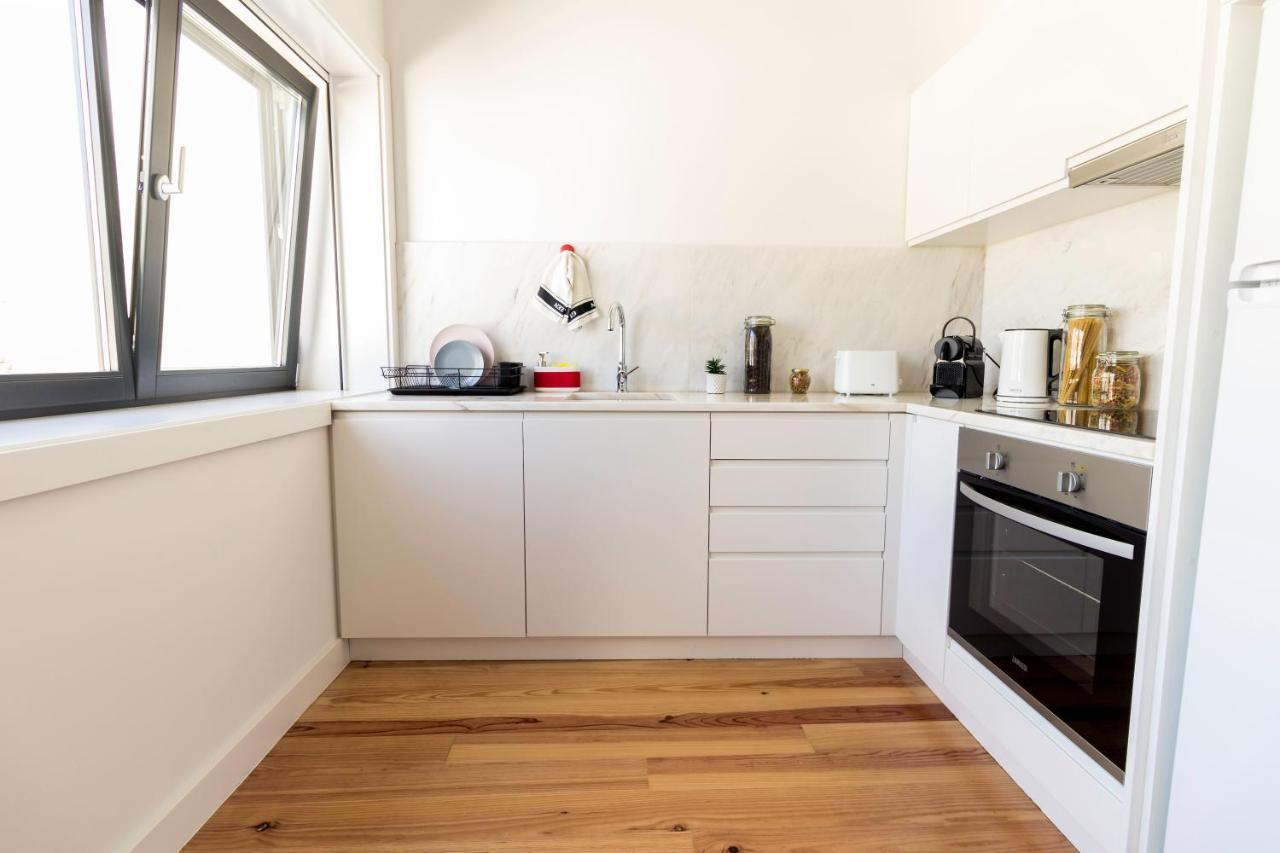 Guest H4U - Porto Batalha City Center Bagian luar foto