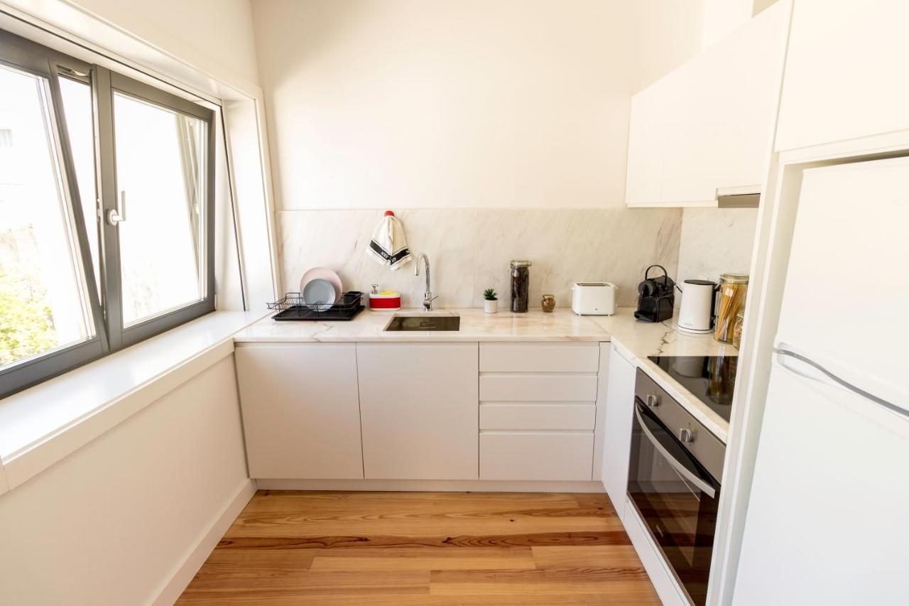 Guest H4U - Porto Batalha City Center Bagian luar foto